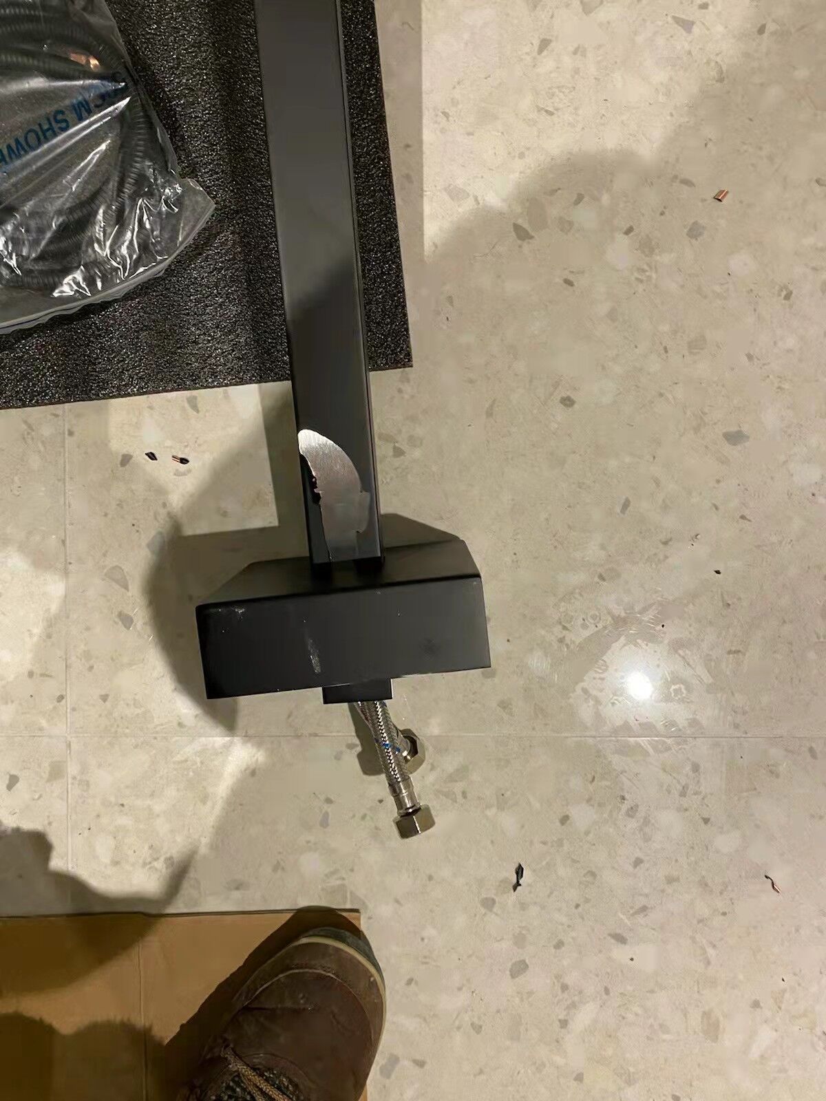 Spray painted black faucet